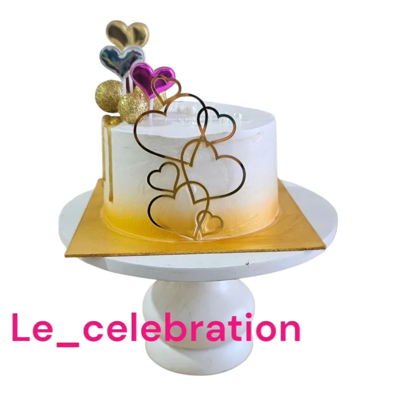 Elegant White & Gold Heart Cake