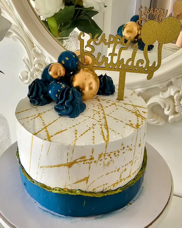 Elegant Blue and Gold Birthday Cake